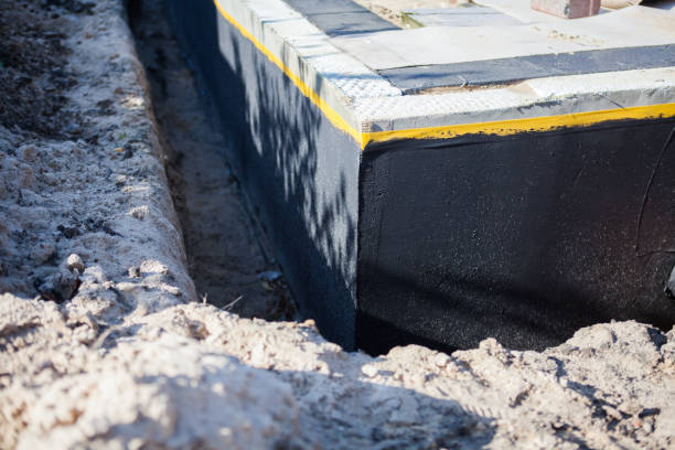 Professional Emergency Waterproofing technician working in Celina, TN